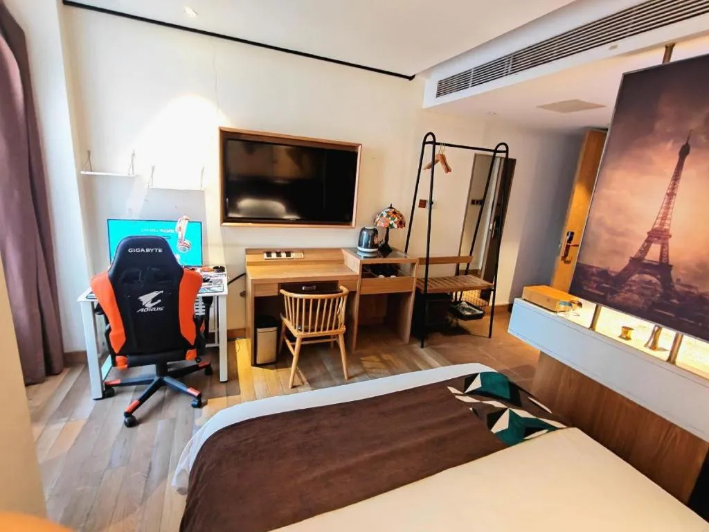 Bed in James Joyce Coffetel Zhengzhou CBD Exhibition Center Provincial People's Hospital