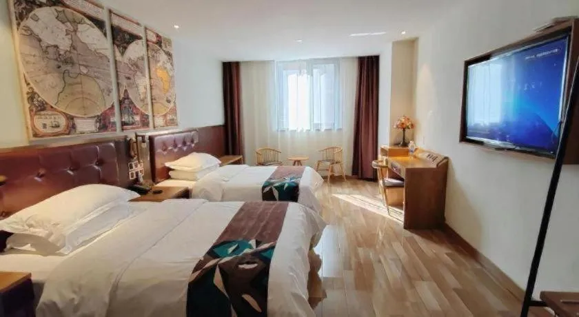 Bed in James Joyce Coffetel Zhengzhou CBD Exhibition Center Provincial People's Hospital