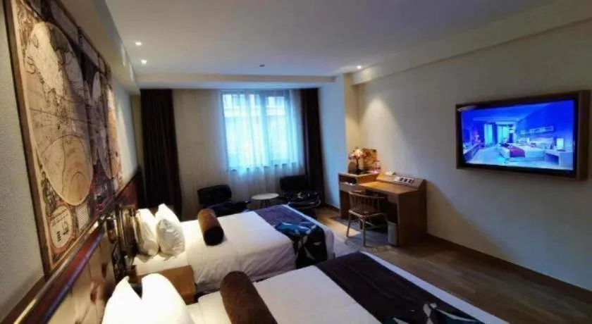 Bed in James Joyce Coffetel Zhengzhou CBD Exhibition Center Provincial People's Hospital