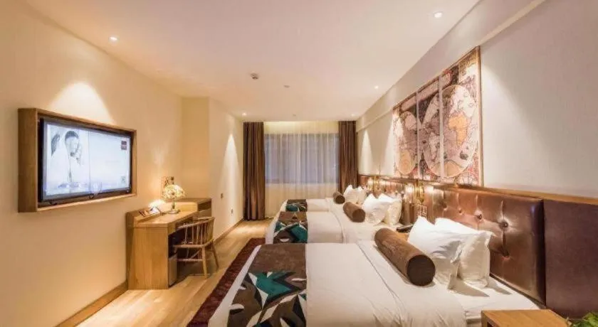 Bed in James Joyce Coffetel Zhengzhou CBD Exhibition Center Provincial People's Hospital