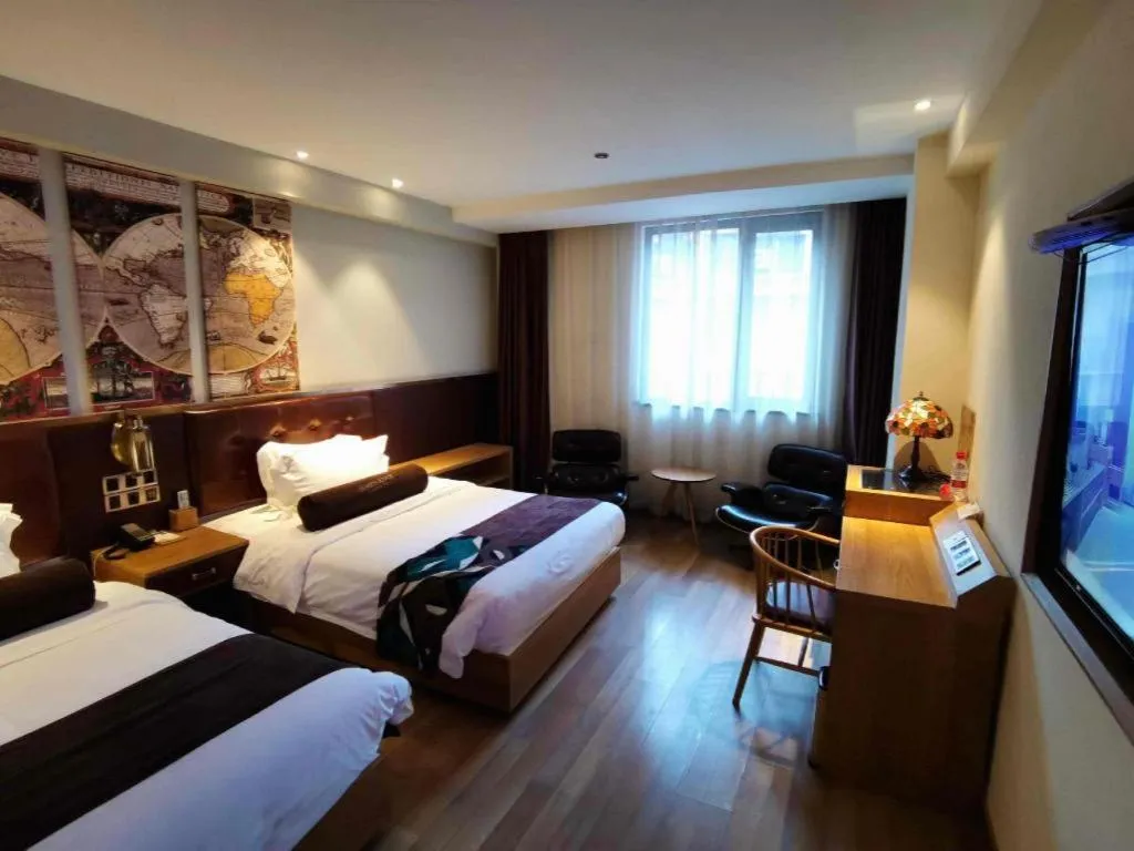 Bed in James Joyce Coffetel Zhengzhou CBD Exhibition Center Provincial People's Hospital
