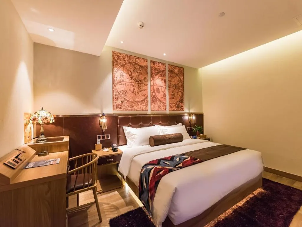 Bed in James Joyce Coffetel Zhengzhou CBD Exhibition Center Provincial People's Hospital