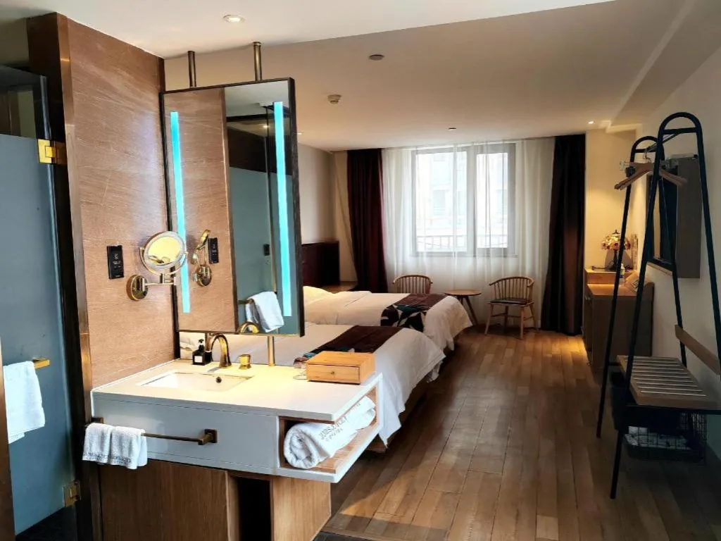 Bed in James Joyce Coffetel Zhengzhou CBD Exhibition Center Provincial People's Hospital