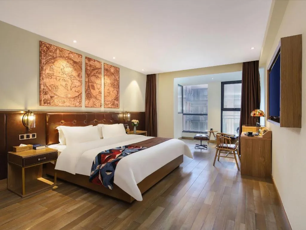 Bed in James Joyce Coffetel Zhengzhou CBD Exhibition Center Provincial People's Hospital