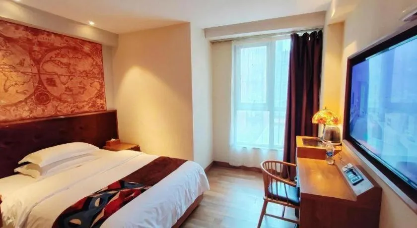 Bed in James Joyce Coffetel Zhengzhou CBD Exhibition Center Provincial People's Hospital