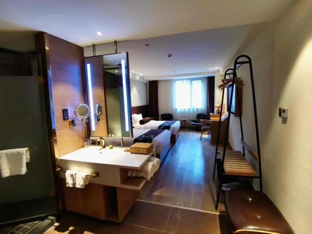 Bed in James Joyce Coffetel Zhengzhou CBD Exhibition Center Provincial People's Hospital