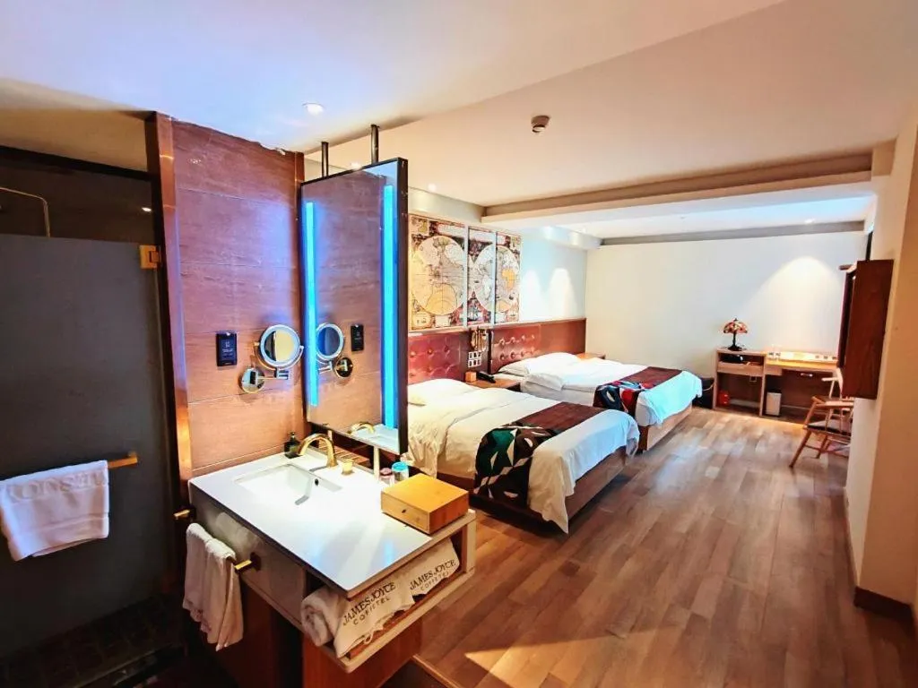 Bed in James Joyce Coffetel Zhengzhou CBD Exhibition Center Provincial People's Hospital