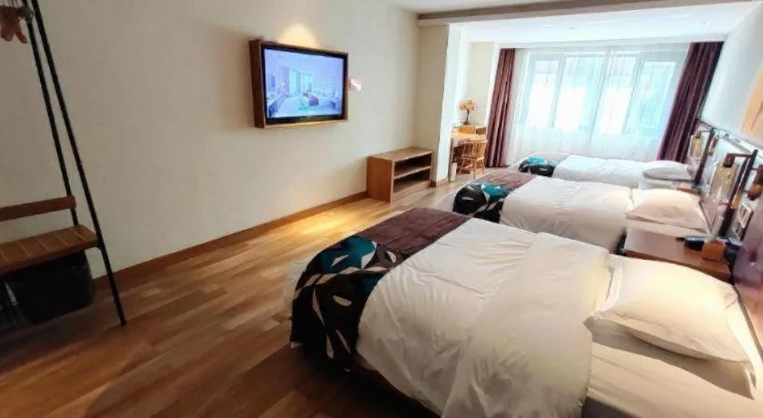 Bed in James Joyce Coffetel Zhengzhou CBD Exhibition Center Provincial People's Hospital