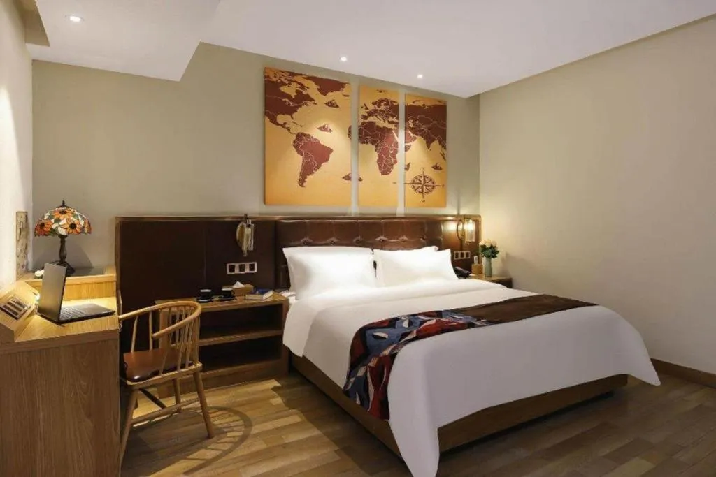 Bed in James Joyce Coffetel Zhengzhou CBD Exhibition Center Provincial People's Hospital