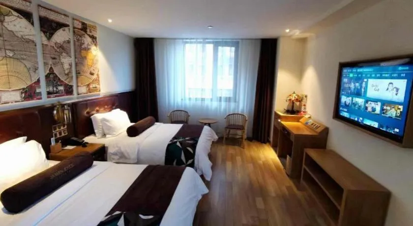 Bed in James Joyce Coffetel Zhengzhou CBD Exhibition Center Provincial People's Hospital