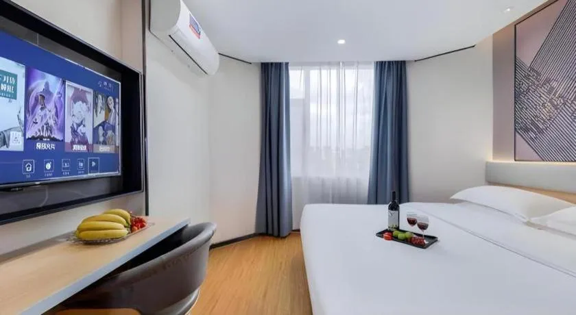 Bed in IU Hotel·Jiayuguan People's Shopping Mall