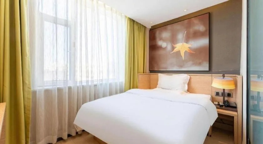 Bed in IU Hotel·Jiayuguan People's Shopping Mall