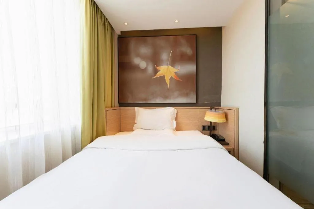 Bed in IU Hotel·Jiayuguan People's Shopping Mall