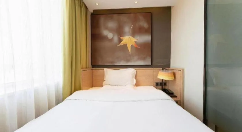 Bed in IU Hotel·Jiayuguan People's Shopping Mall