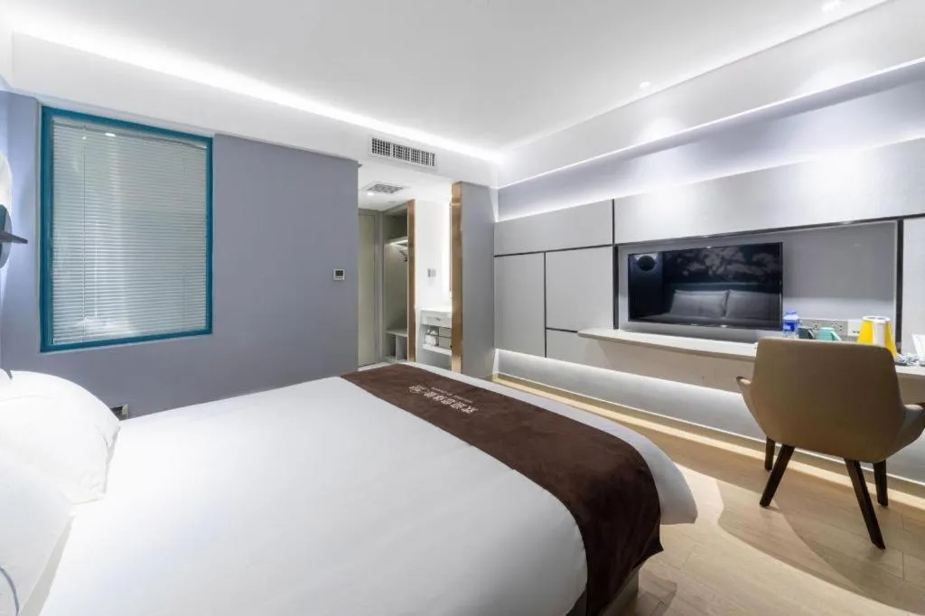 Bed in Magnotel Hotel Anshun West High-Speed Railway Station