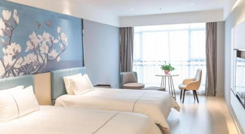 Bed in Magnotel Hotel Anshun West High-Speed Railway Station