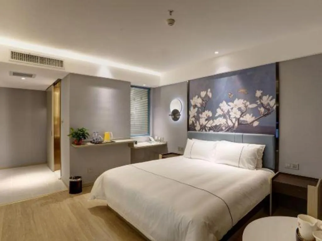 Bed in Magnotel Hotel Anshun West High-Speed Railway Station