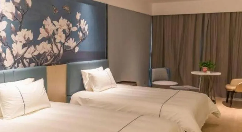 Bed in Magnotel Hotel Anshun West High-Speed Railway Station