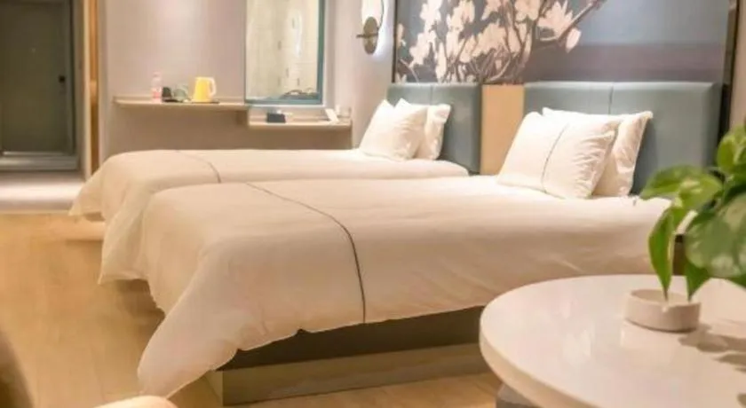 Bed in Magnotel Hotel Anshun West High-Speed Railway Station