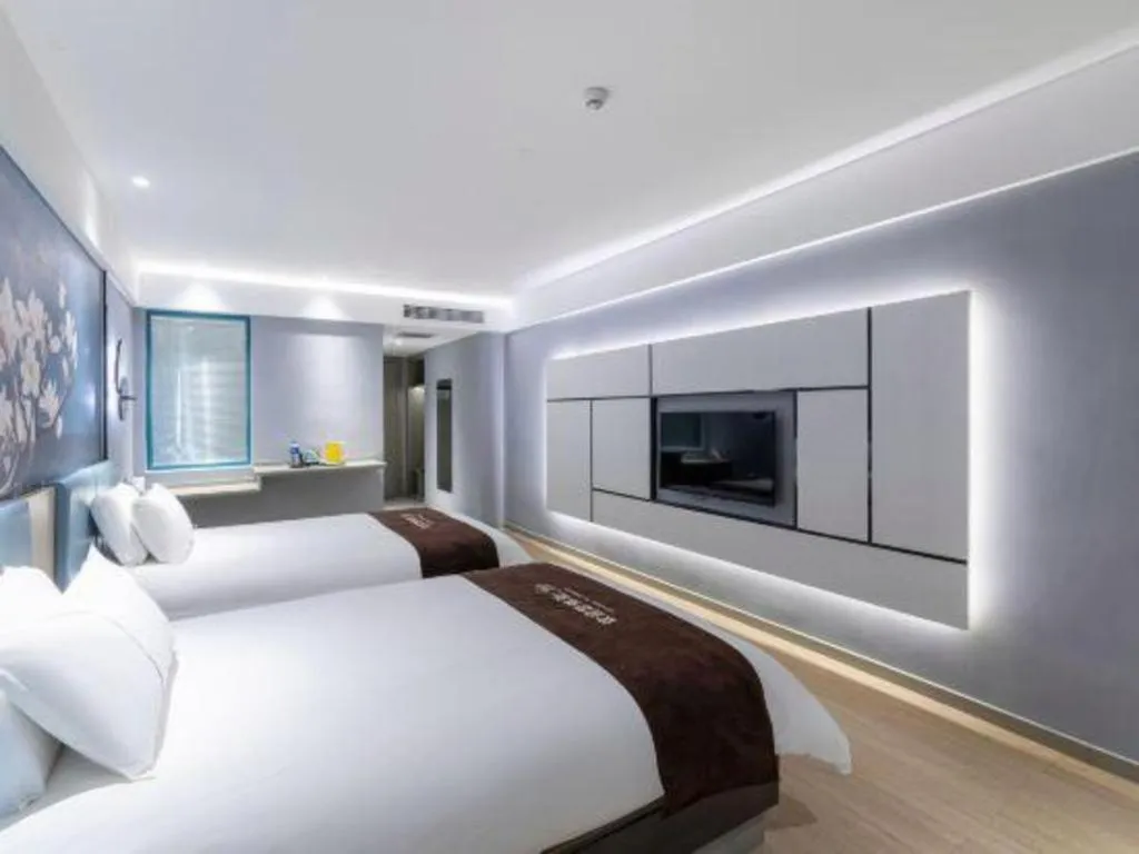 Bed in Magnotel Hotel Anshun West High-Speed Railway Station