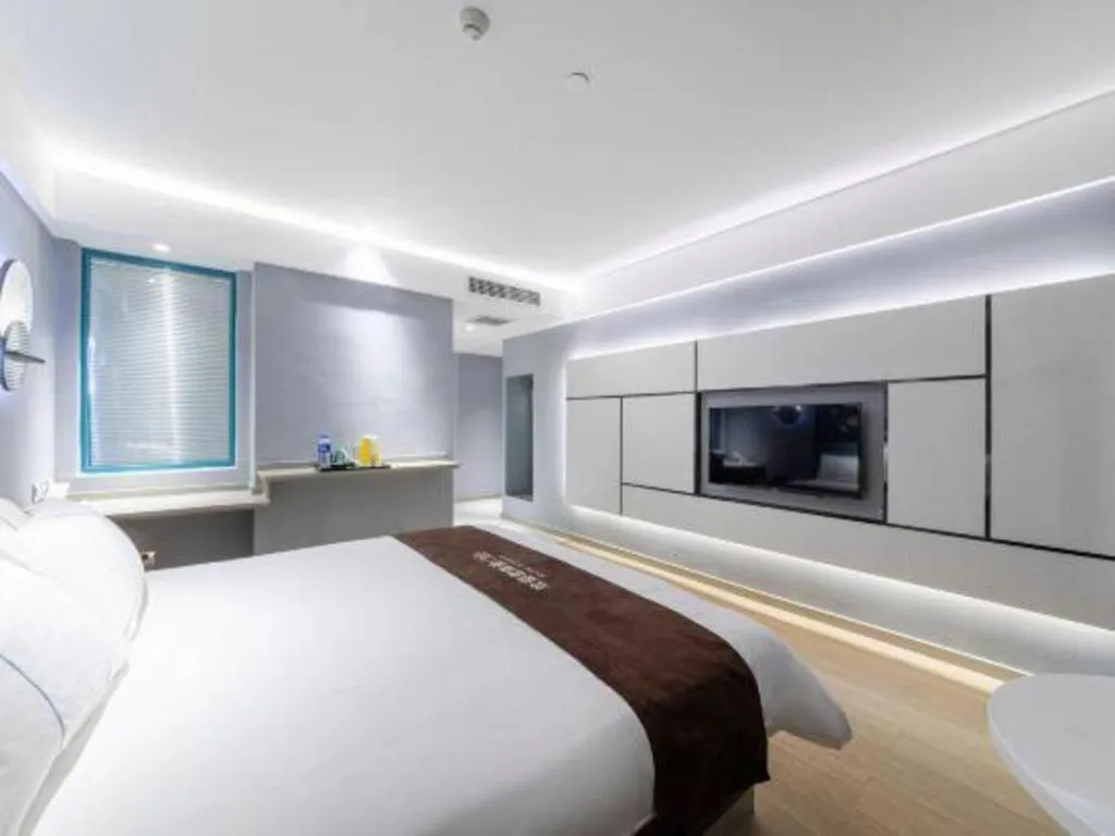 Bed in Magnotel Hotel Anshun West High-Speed Railway Station