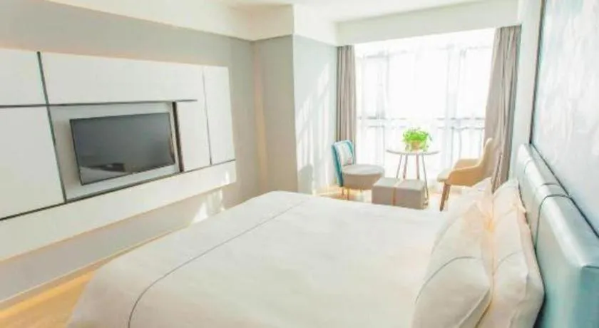 Bed in Magnotel Hotel Anshun West High-Speed Railway Station