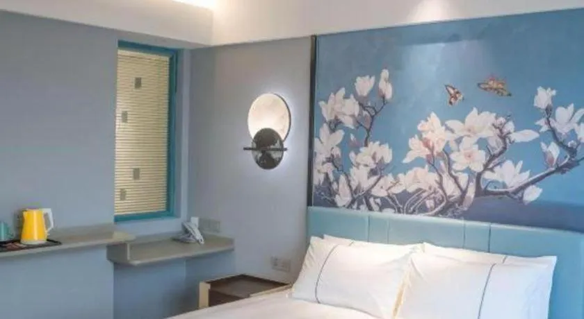 Bed in Magnotel Hotel Anshun West High-Speed Railway Station