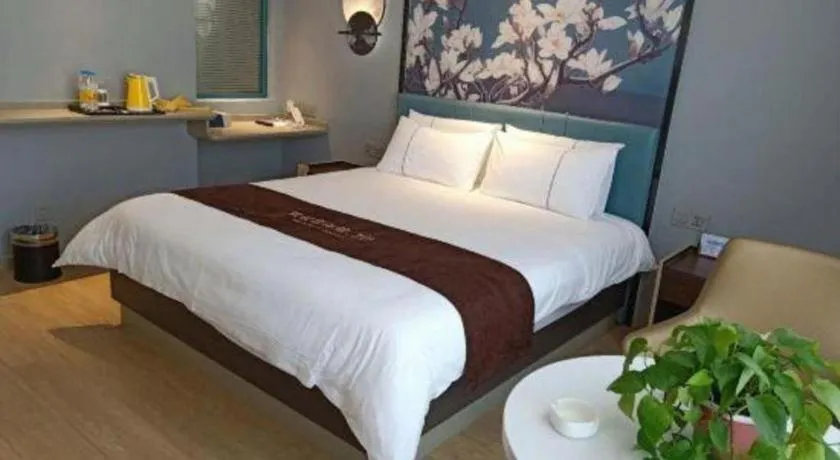 Bed in Magnotel Hotel Anshun West High-Speed Railway Station