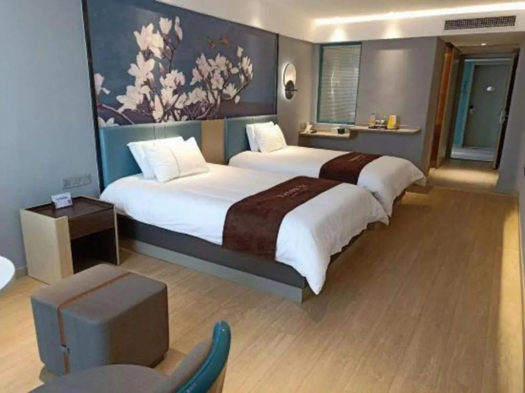 Bed in Magnotel Hotel Anshun West High-Speed Railway Station