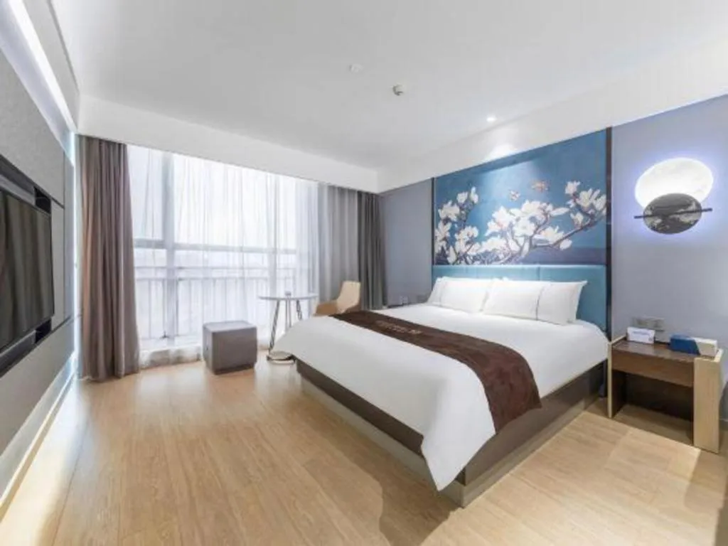 Bed in Magnotel Hotel Anshun West High-Speed Railway Station