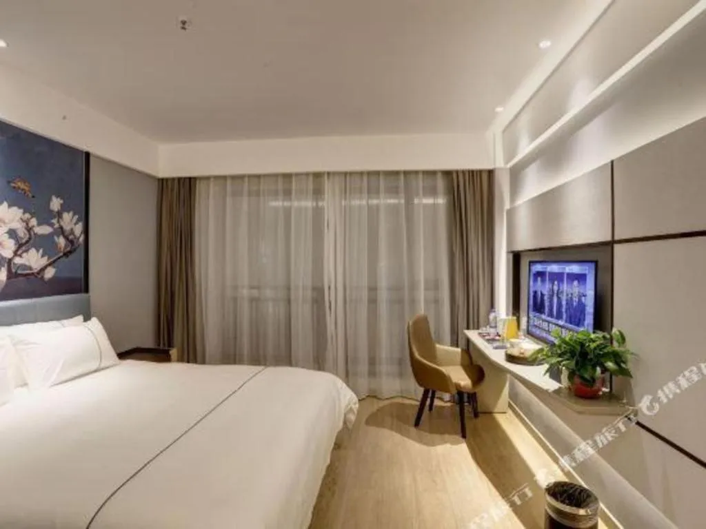 Bed in Magnotel Hotel Anshun West High-Speed Railway Station