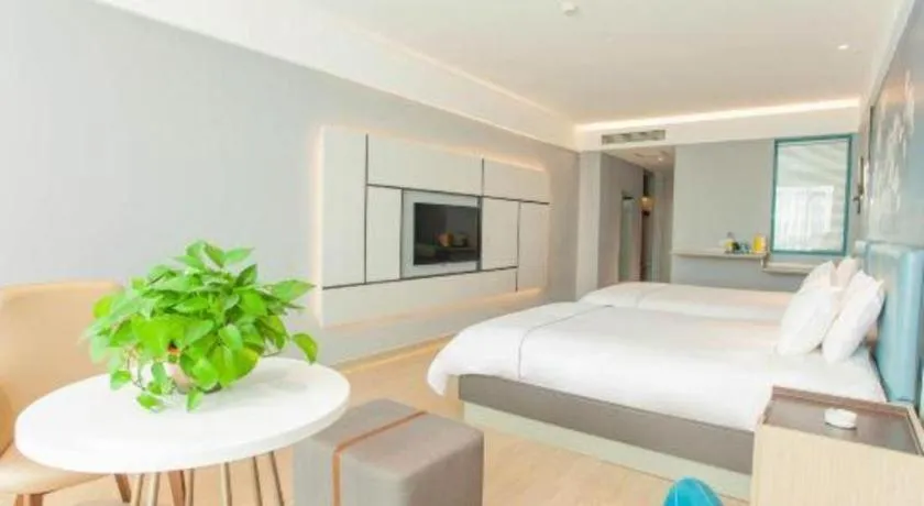 Bed in Magnotel Hotel Anshun West High-Speed Railway Station