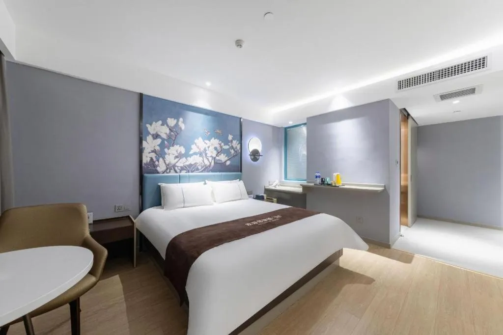 Bed in Magnotel Hotel Anshun West High-Speed Railway Station