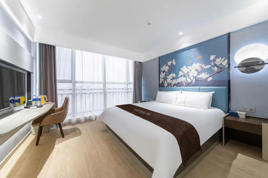 Bed in Magnotel Hotel Anshun West High-Speed Railway Station