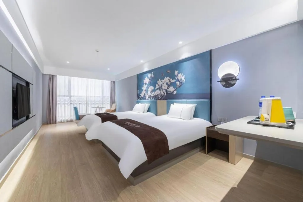 Bed in Magnotel Hotel Anshun West High-Speed Railway Station