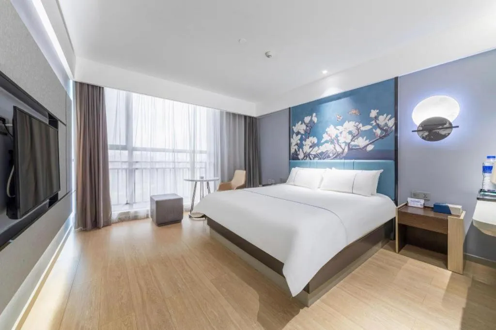 Bed in Magnotel Hotel Anshun West High-Speed Railway Station