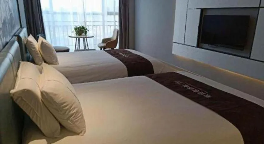 Bed in Magnotel Hotel Anshun West High-Speed Railway Station