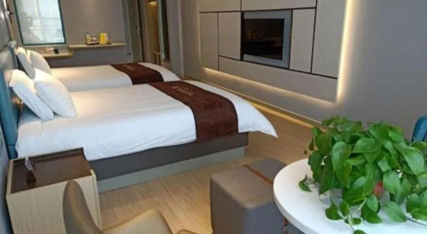 Bed in Magnotel Hotel Anshun West High-Speed Railway Station