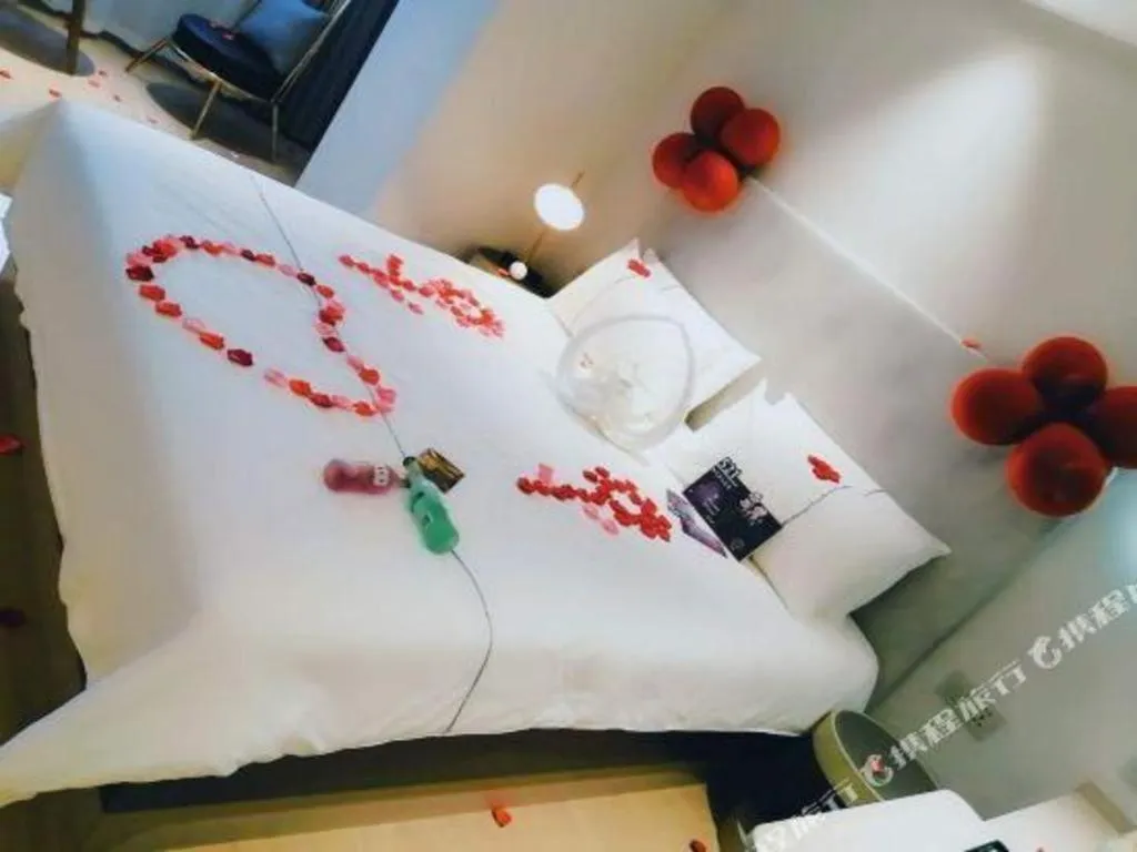 Bed in Magnotel Hotel Suzhou Guanqian Street Pingjiang Road