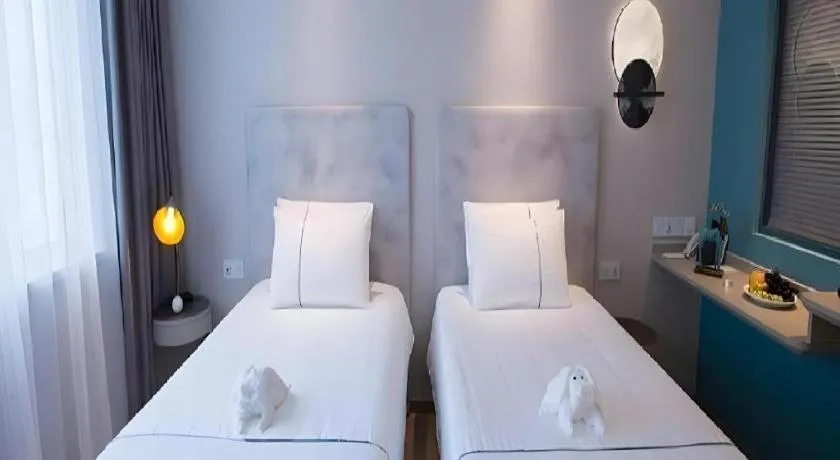 Bed in Magnotel Hotel Suzhou Guanqian Street Pingjiang Road