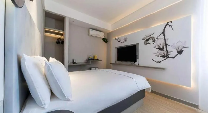 Bed in Magnotel Hotel Suzhou Guanqian Street Pingjiang Road
