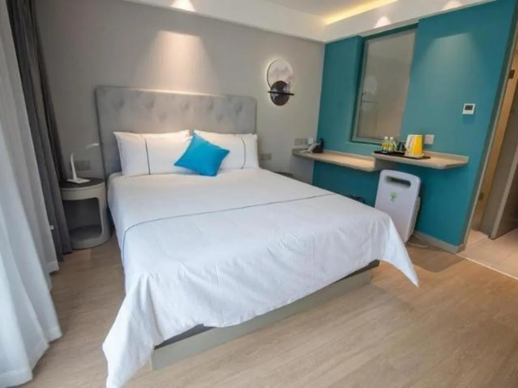 Bed in Magnotel Hotel Suzhou Guanqian Street Pingjiang Road