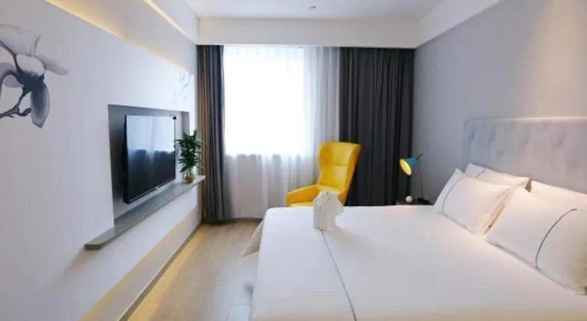 Bed in Magnotel Hotel Suzhou Guanqian Street Pingjiang Road