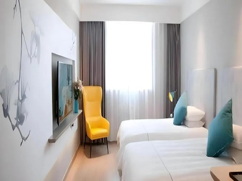 Bed in Magnotel Hotel Suzhou Guanqian Street Pingjiang Road