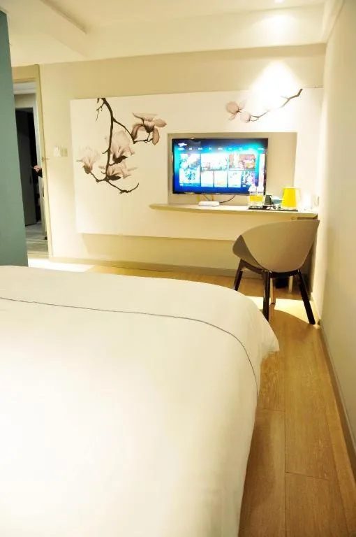 Bed in Magnotel Hotel Suzhou Guanqian Street Pingjiang Road