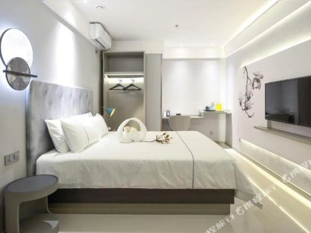 Bed in Magnotel Hotel Jining Yanzhou Metro Station Jiuxianqiao South Road