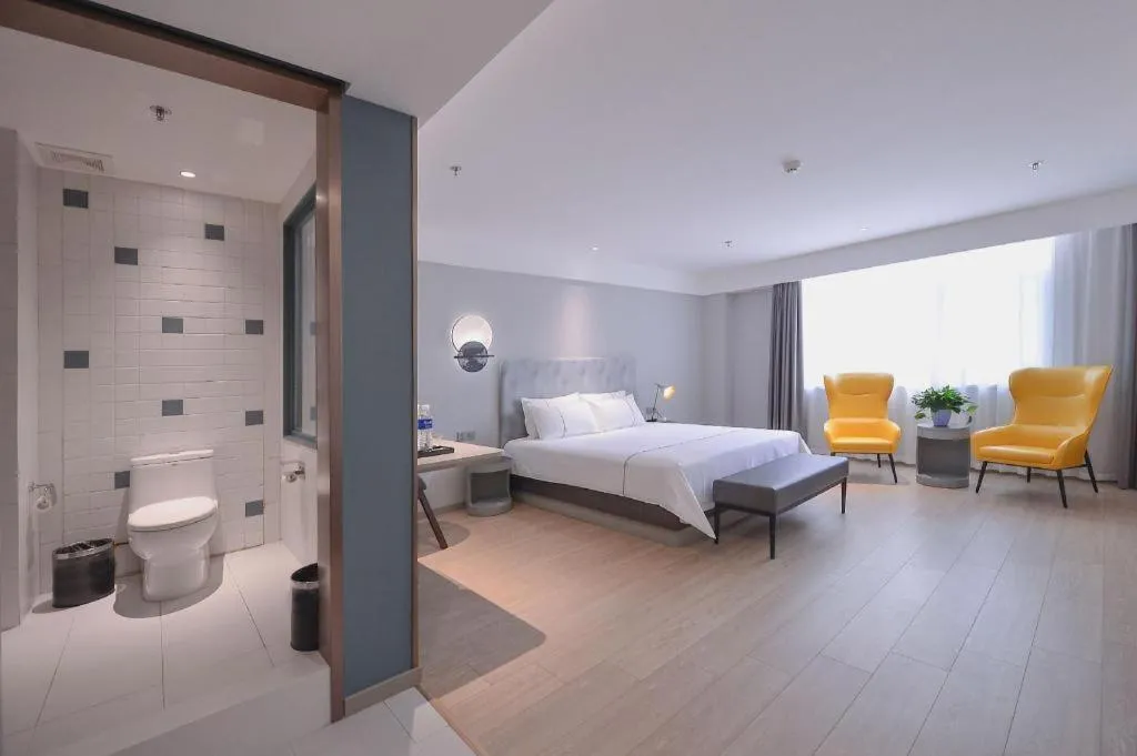 Bed in Magnotel Hotel Jining Yanzhou Metro Station Jiuxianqiao South Road