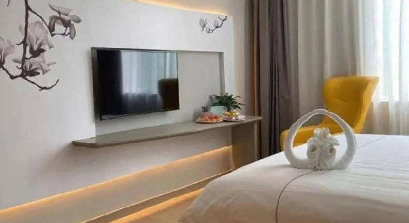 Bed in Magnotel Hotel Jining Yanzhou Metro Station Jiuxianqiao South Road