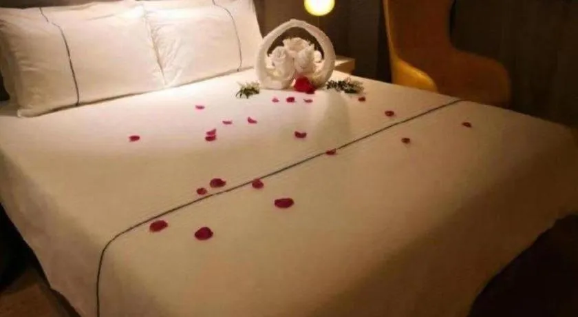 Bed in Magnotel Hotel Jining Yanzhou Metro Station Jiuxianqiao South Road