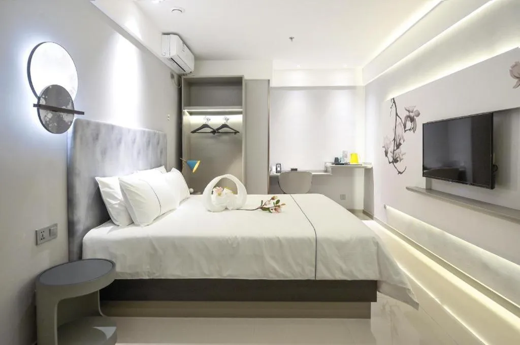 Bed in Magnotel Hotel Jining Yanzhou Metro Station Jiuxianqiao South Road